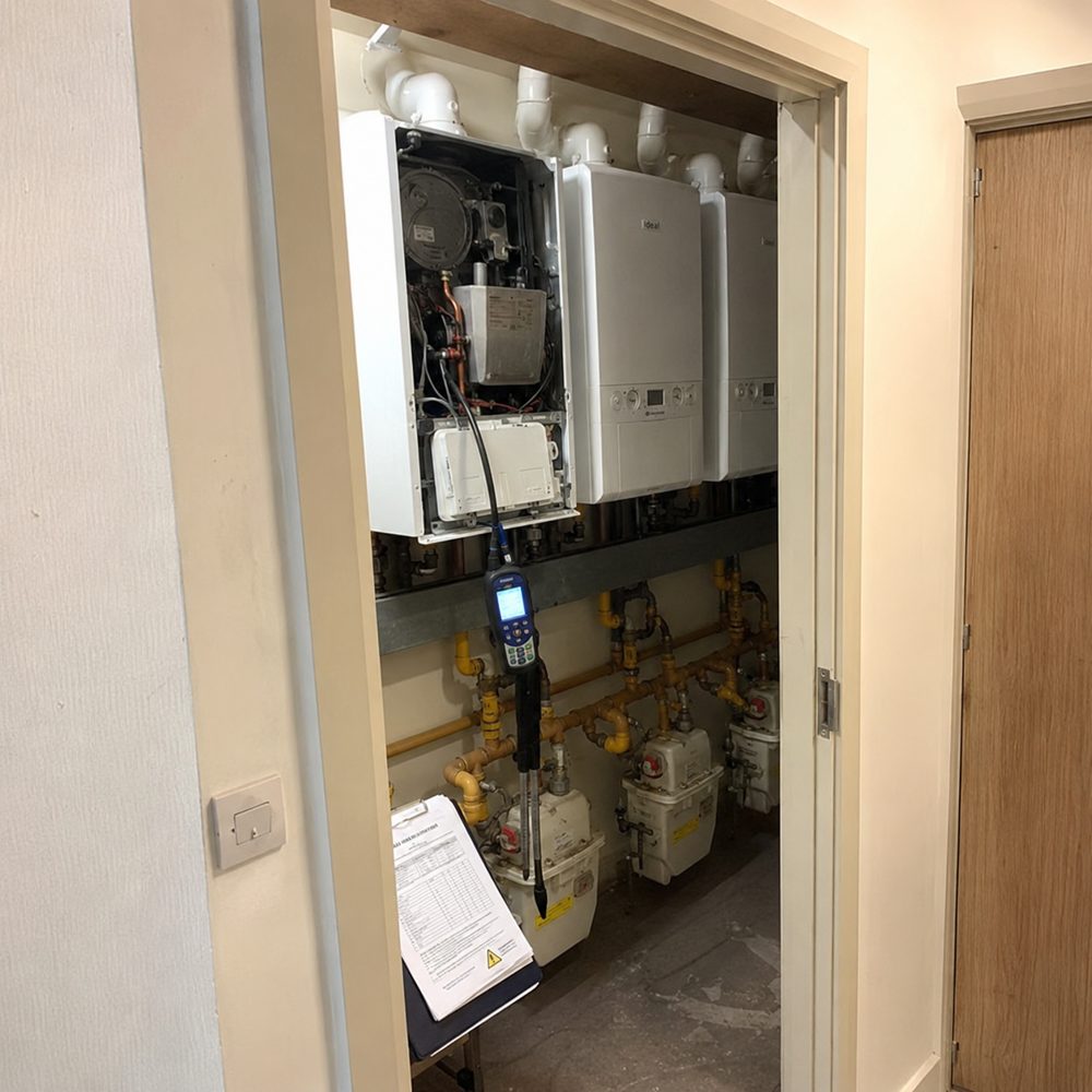 Landlord gas safety inspection of boilers and meters in a Reading block of flats